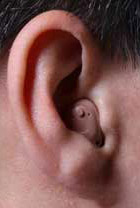 Hearing aids like this one can help people hear who are experiencing hearing loss